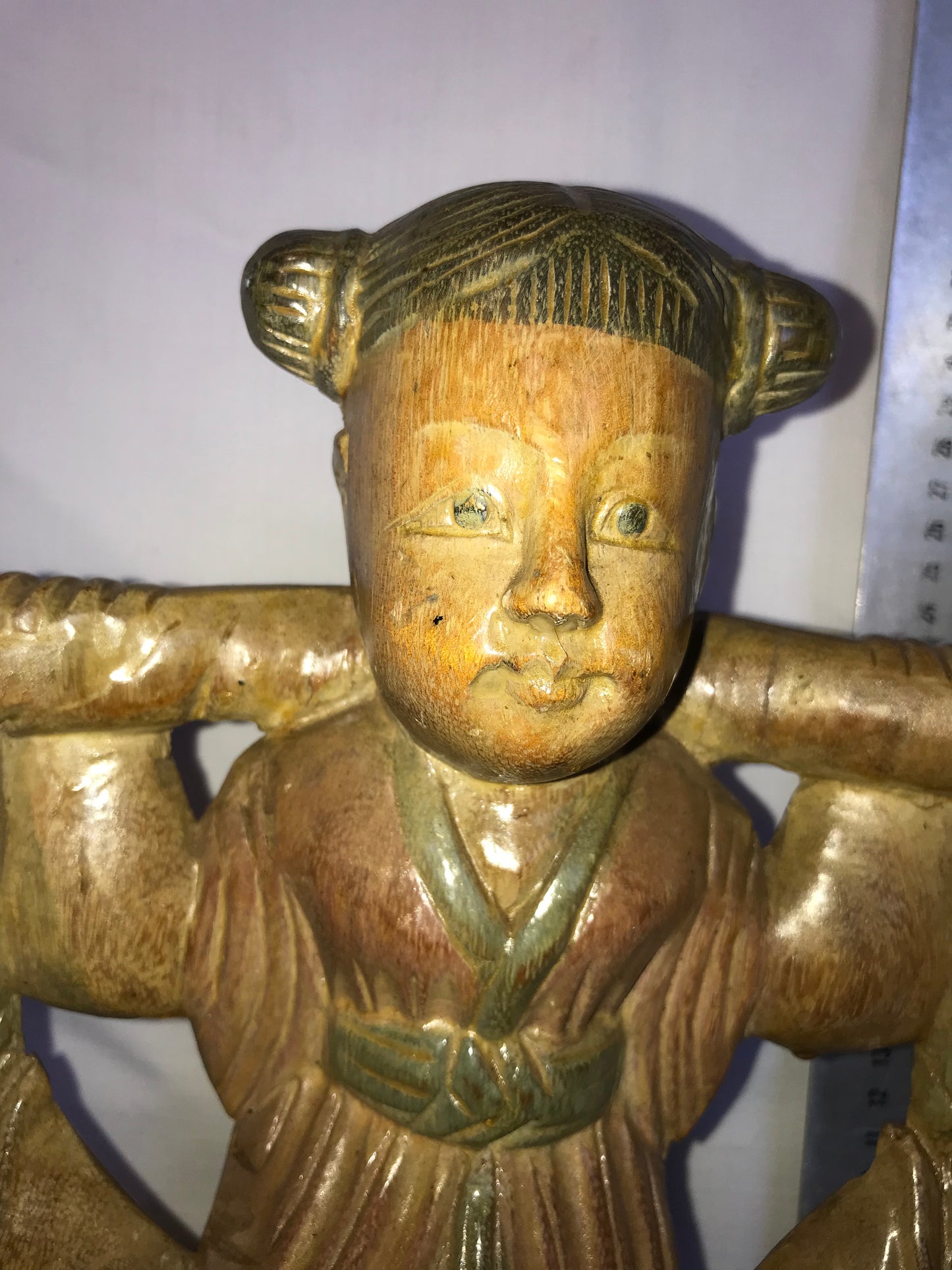 Eastern carved wooden statue