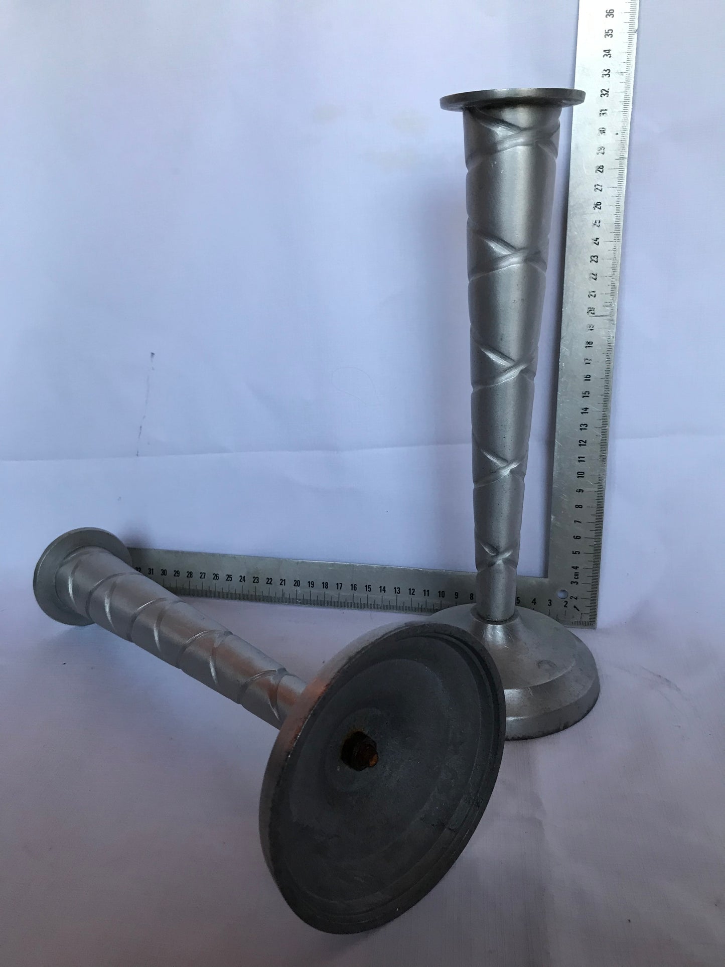 Pair of tall candle sticks