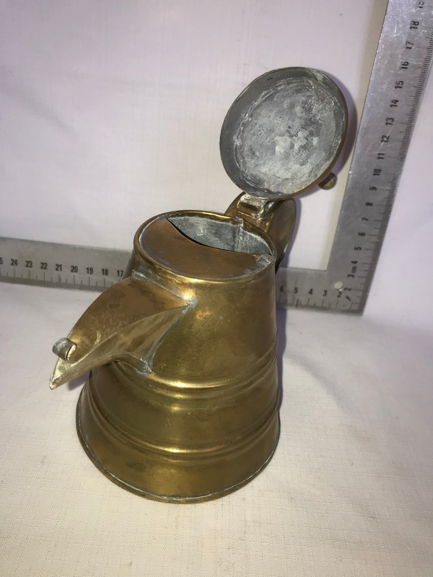 Pointy lip brass tea pot