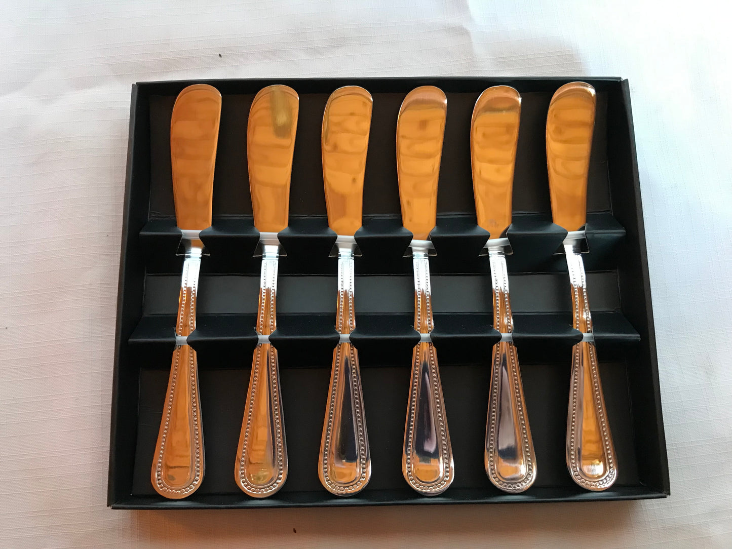 Set of six butter knives