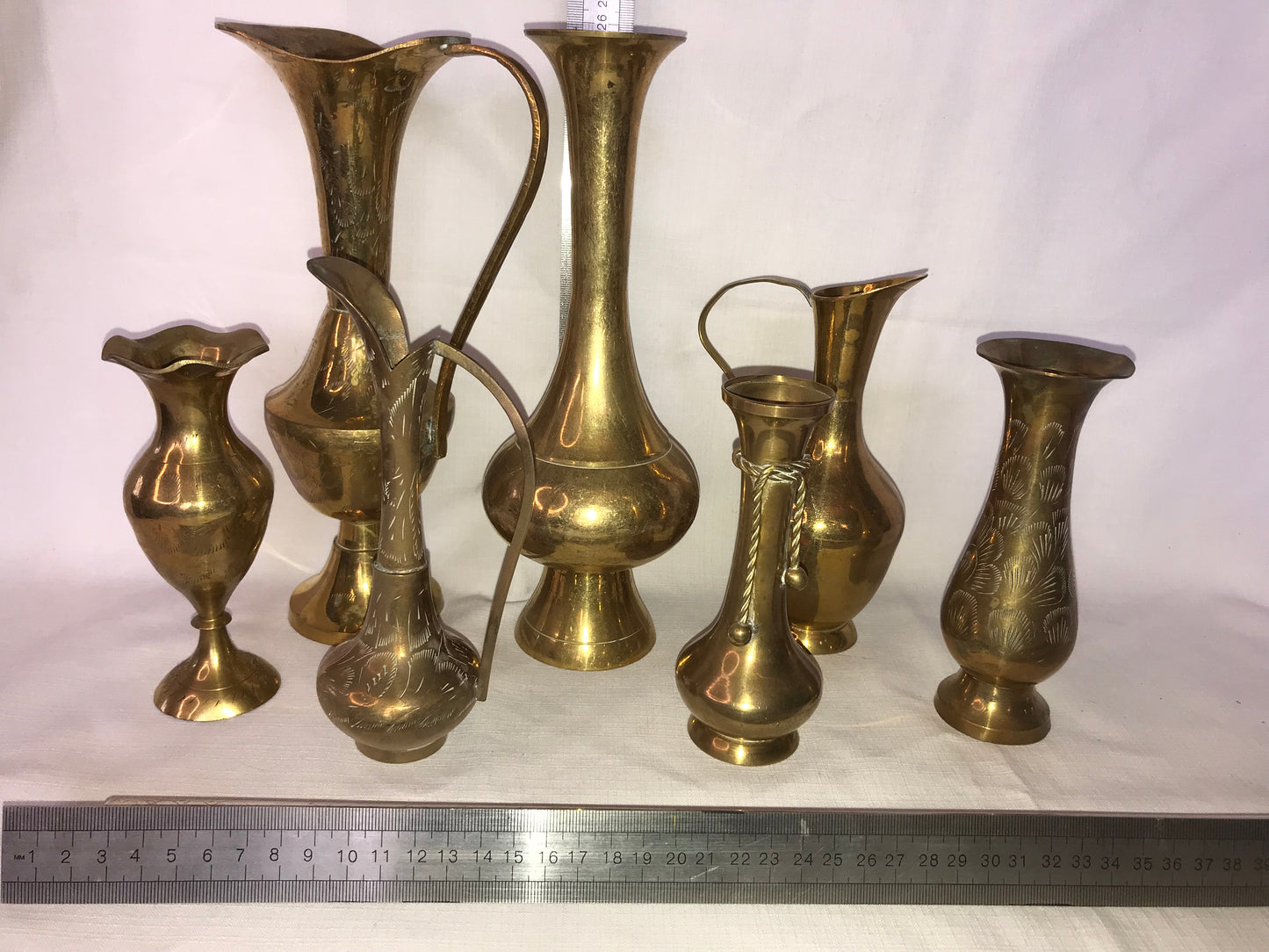 Group of 7 brass vases