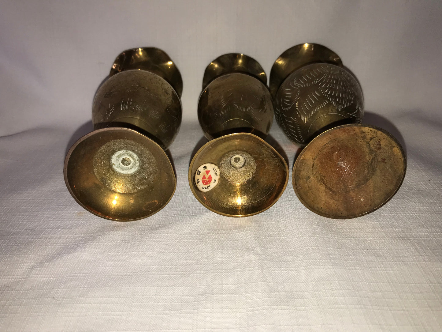 3 small brass vases