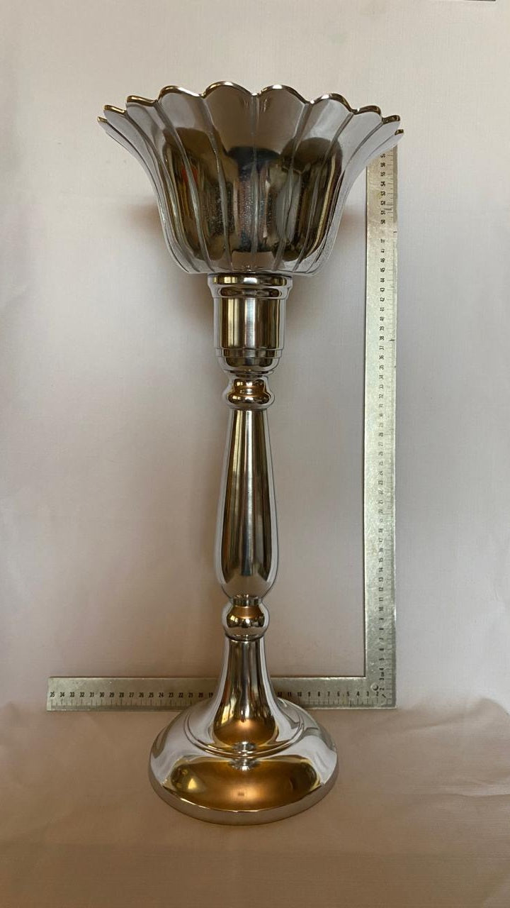 Tall metal candle stick