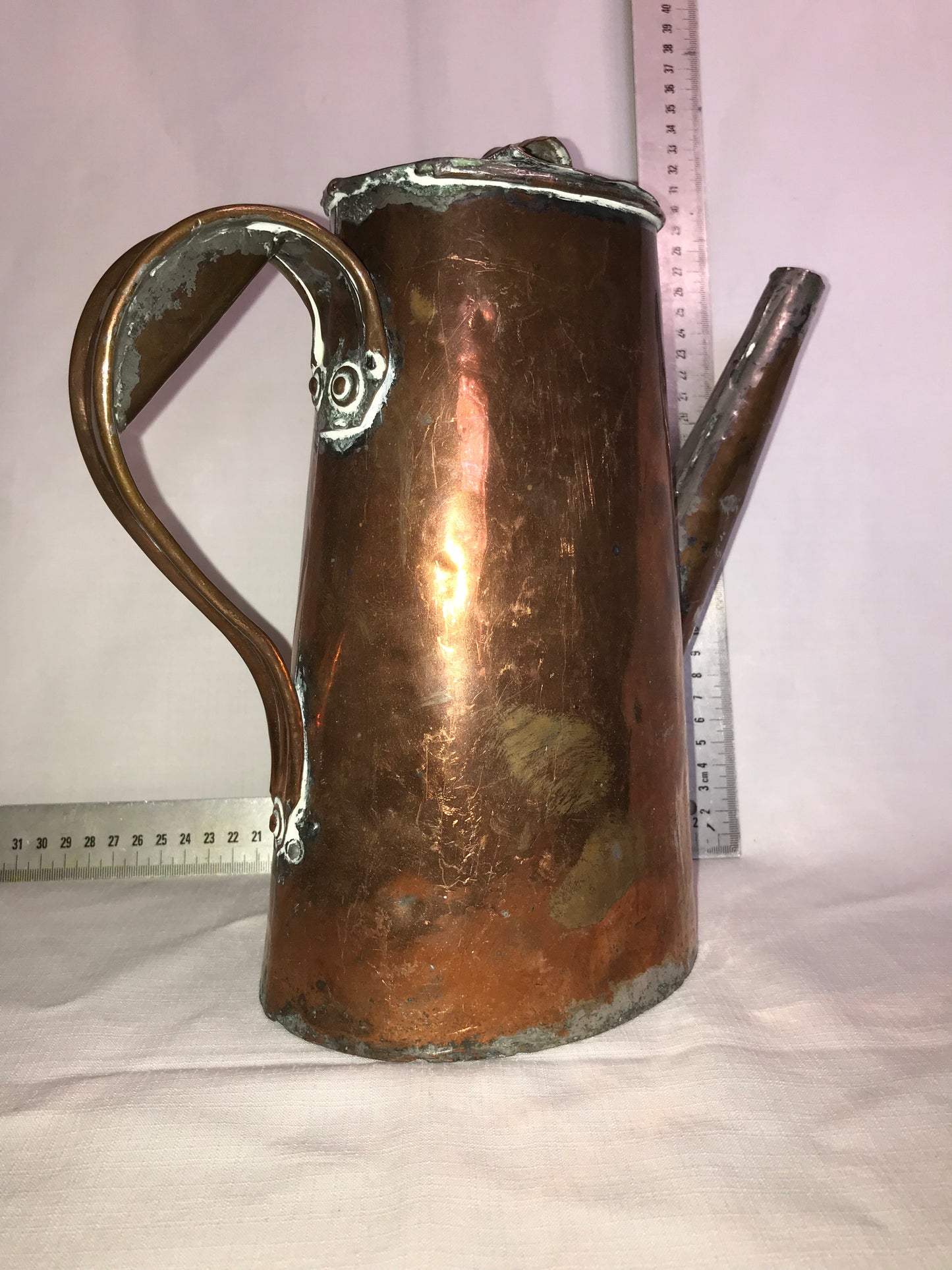 Rustic copper tea pot