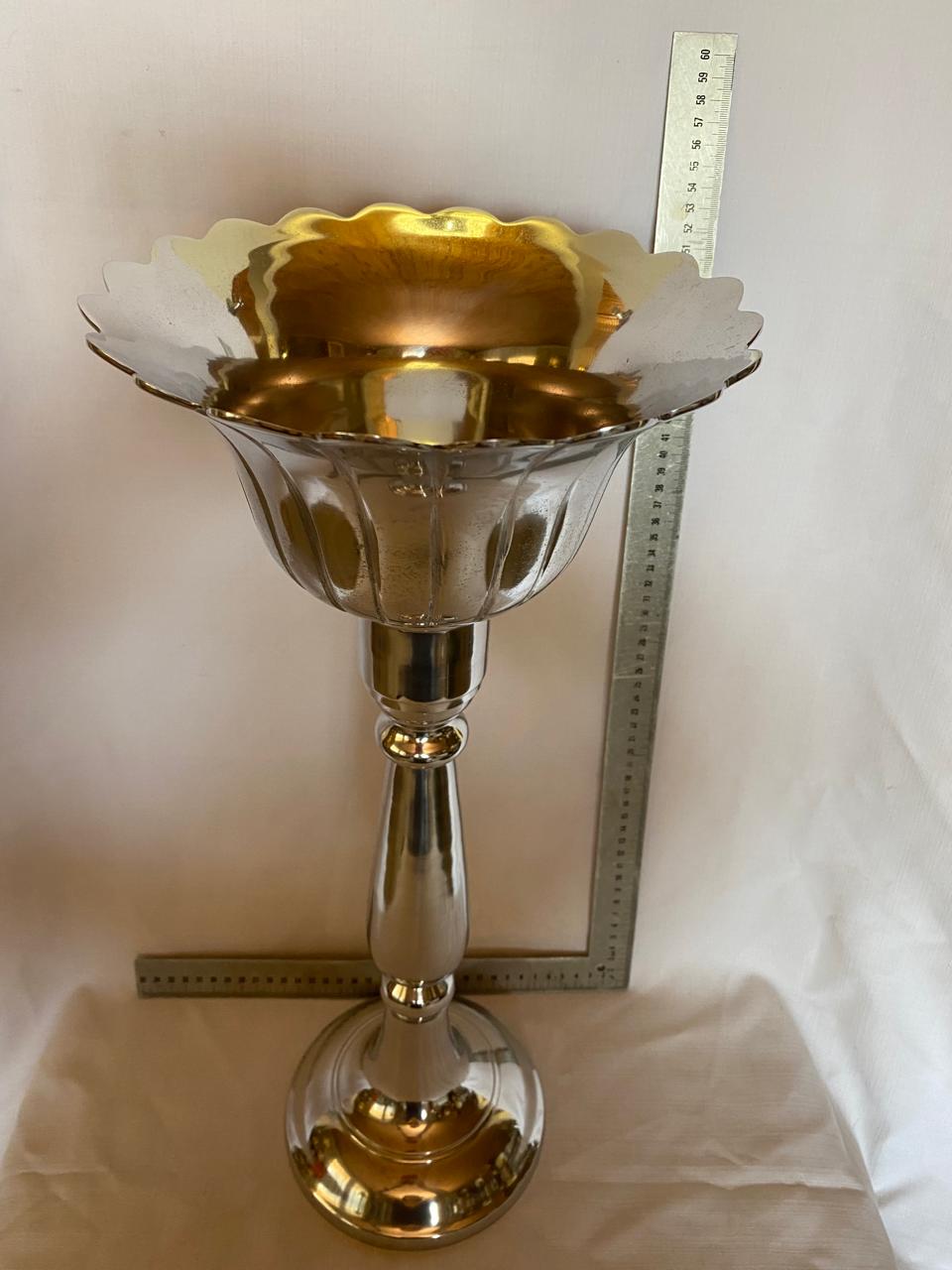 Tall metal candle stick