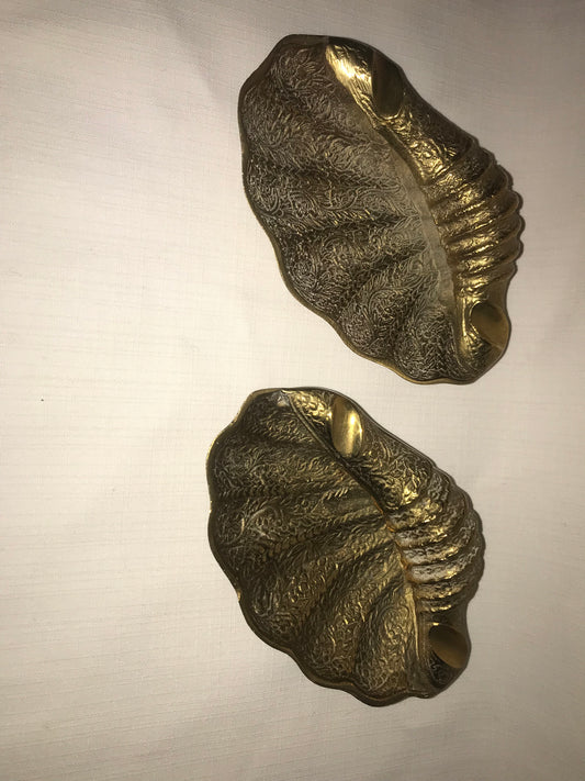 Two brass sea shell ass tray's