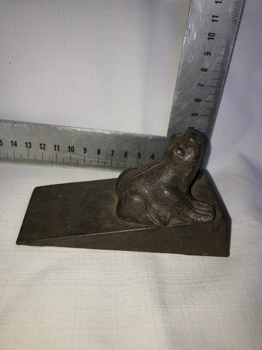Heavy metal frog door stop