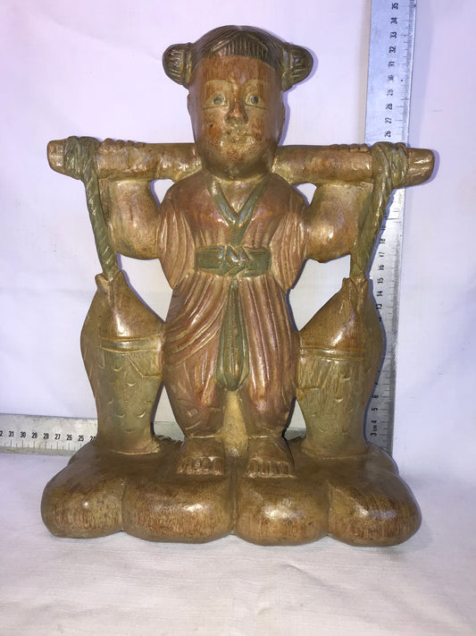 Eastern carved wooden statue