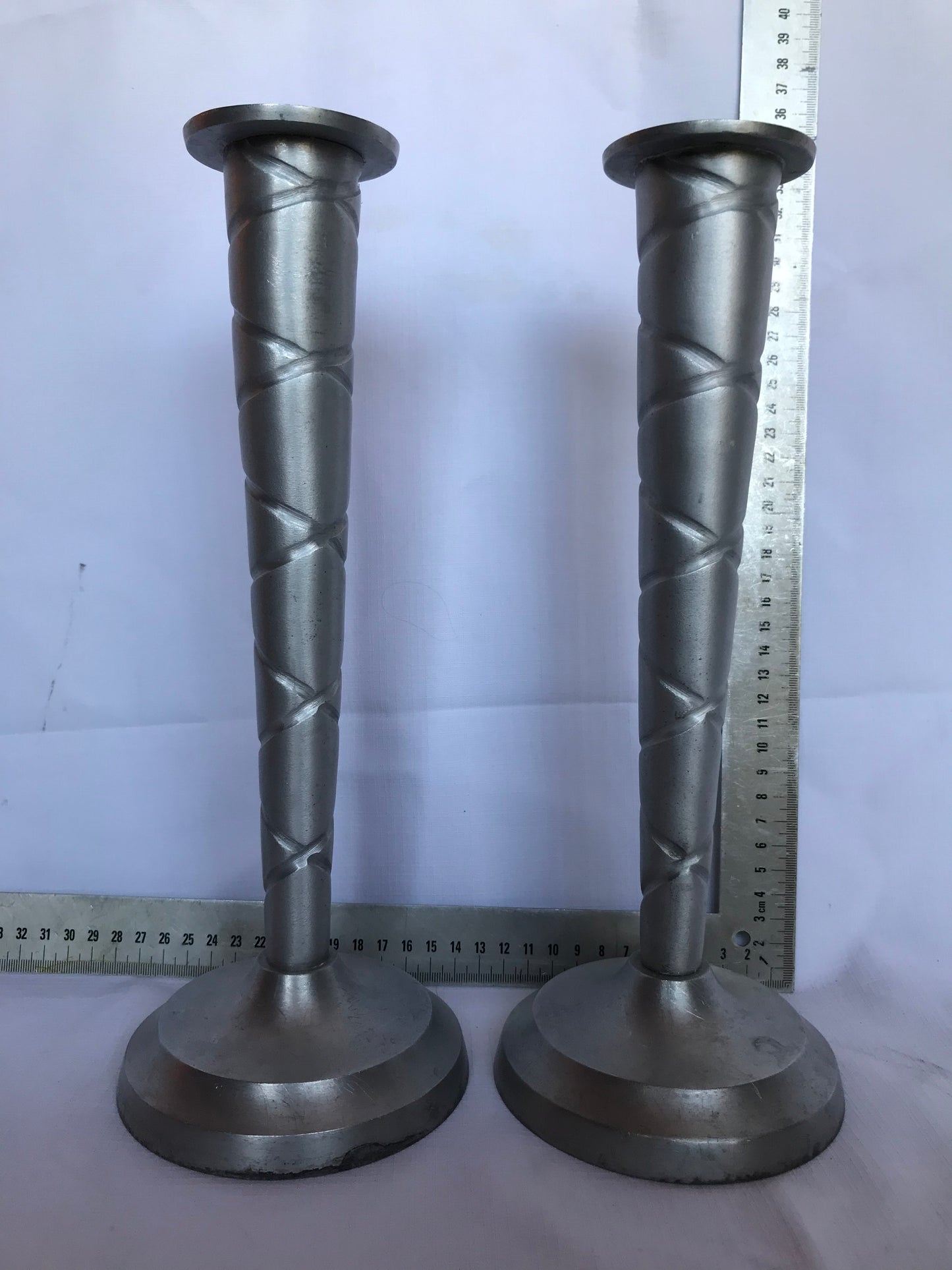 Pair of tall candle sticks