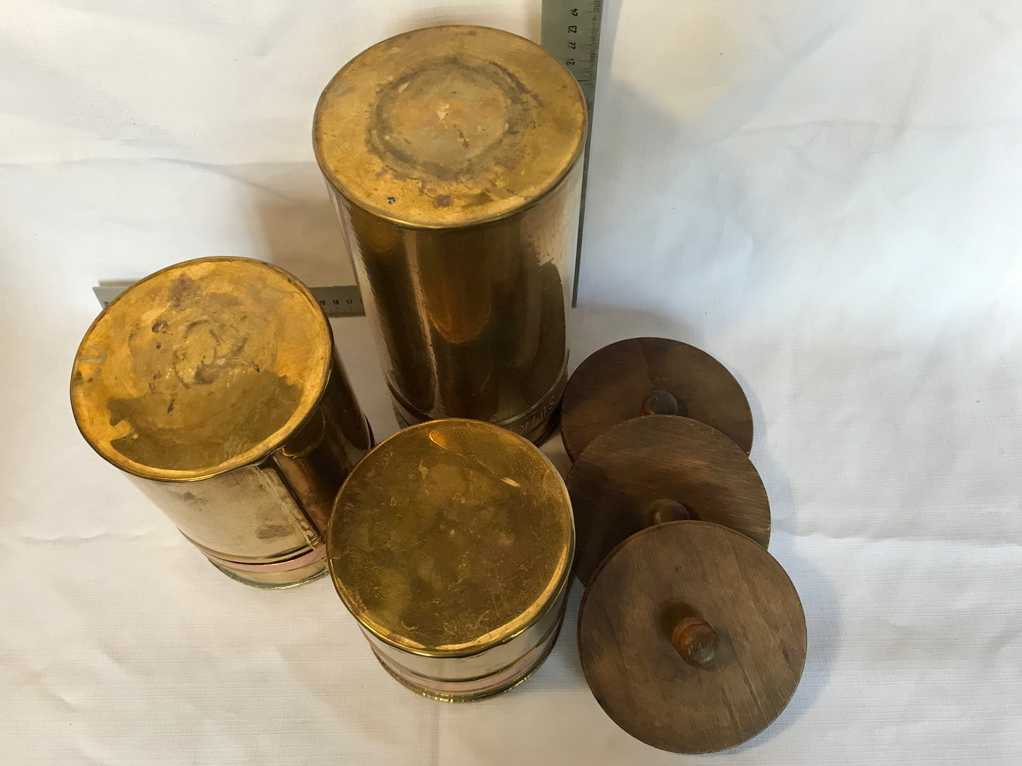 Set of three brass and copper containers