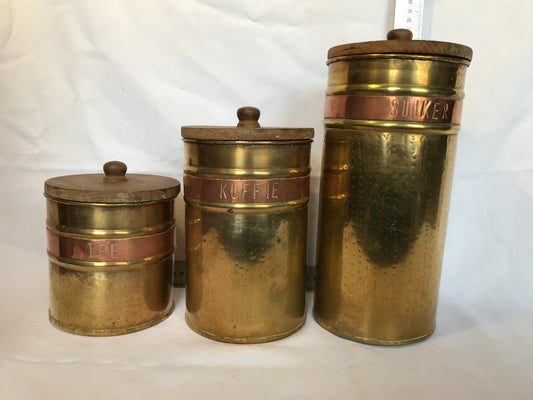 Set of three brass and copper containers