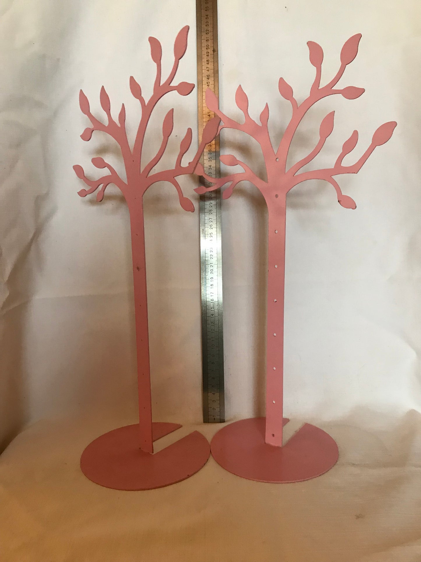 Pair of pink jewelry and accessories stands, pre-loved