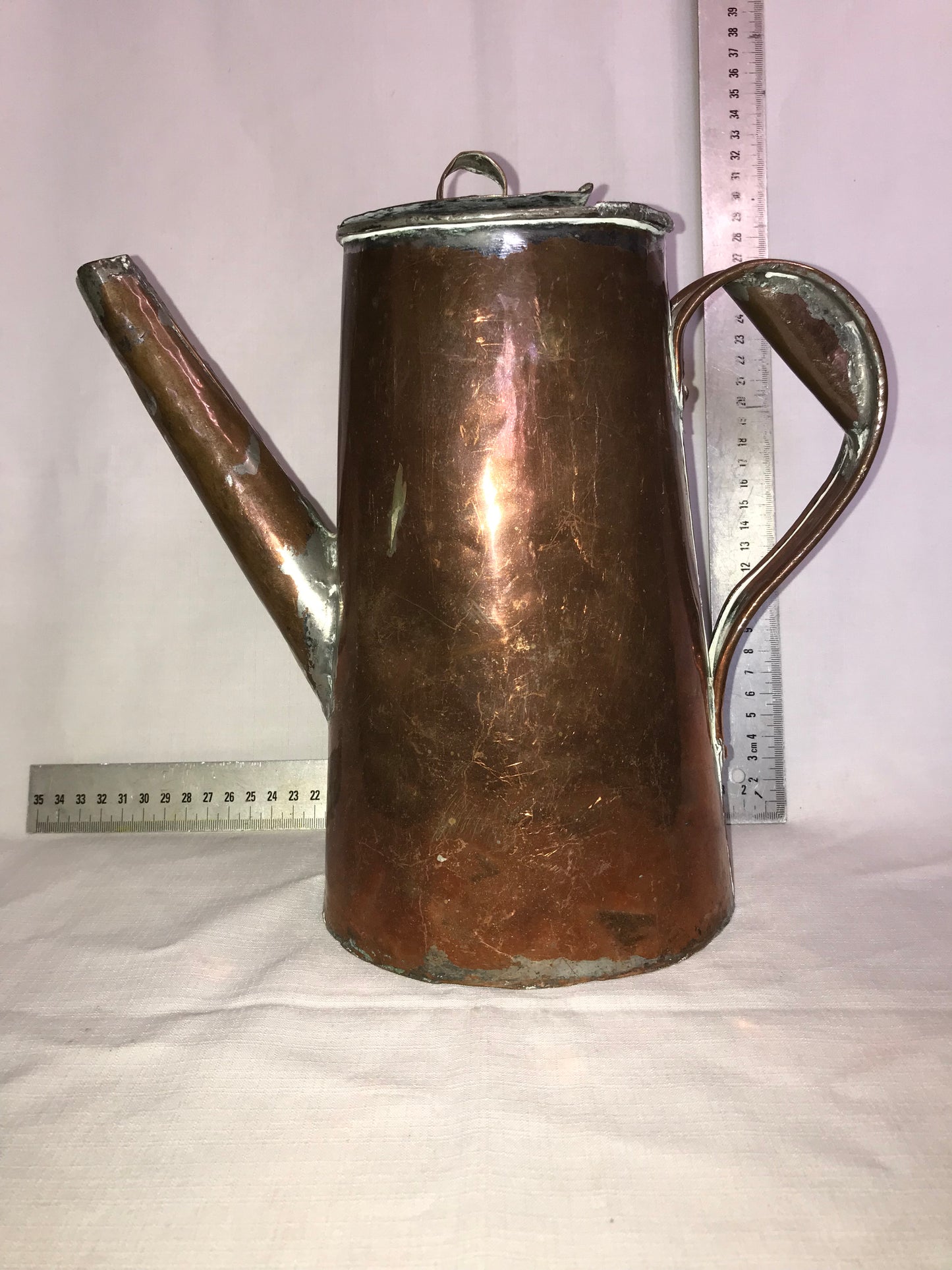 Rustic copper tea pot