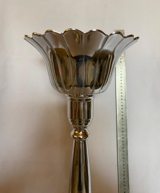 Tall metal candle stick