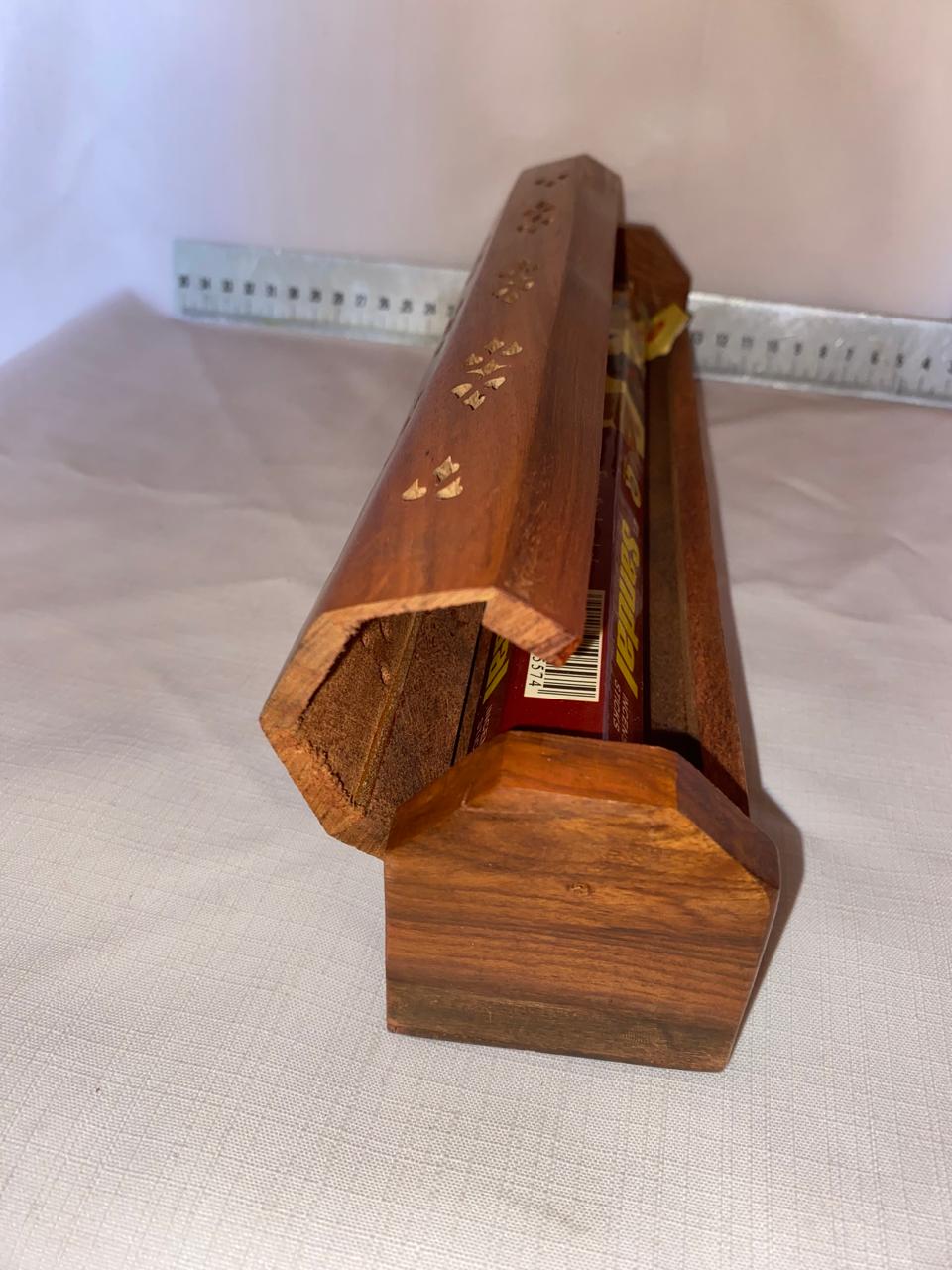 Wooden incense box with brass elephant inlays