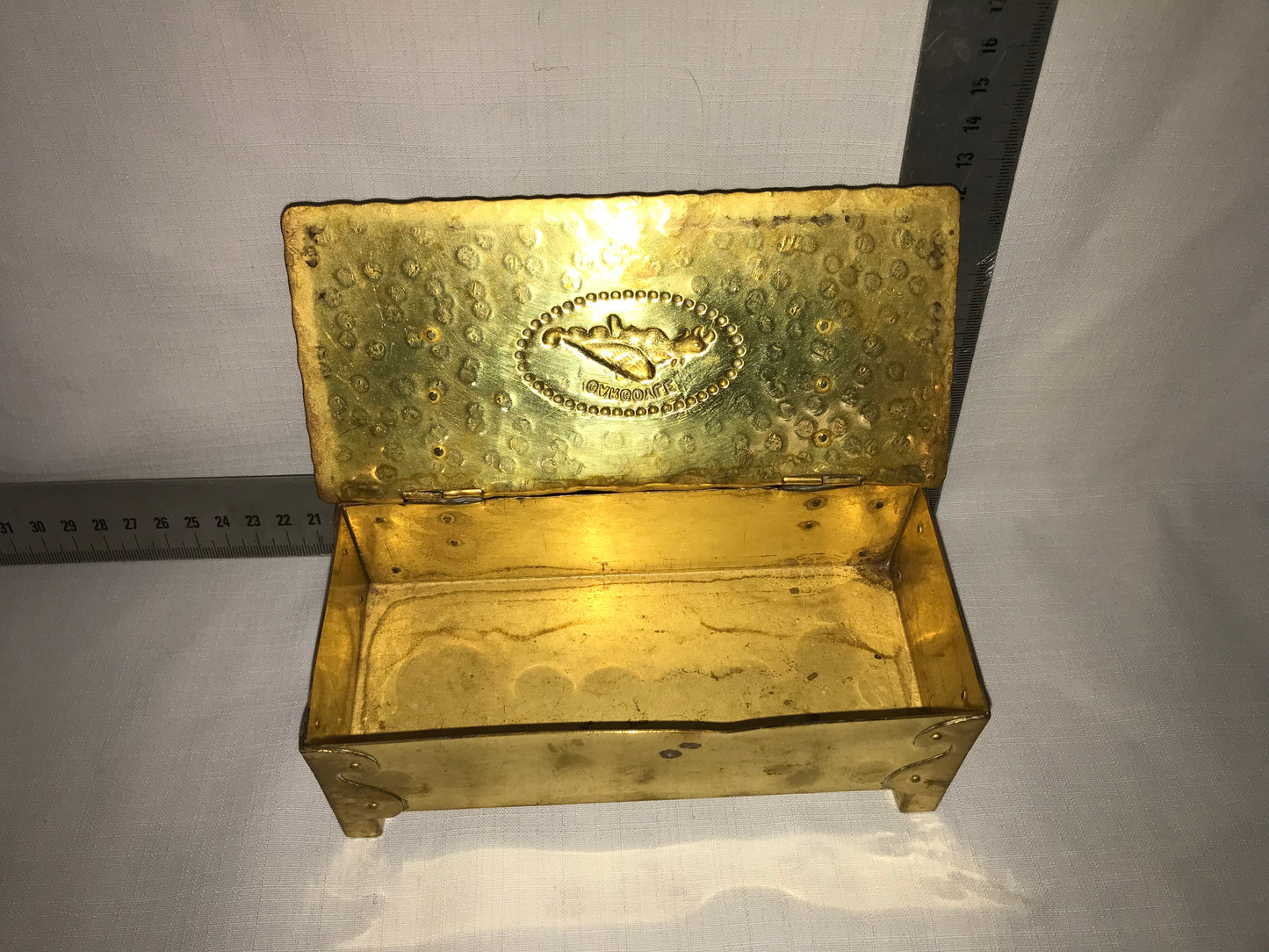 Brass box that says Gargoyle on top