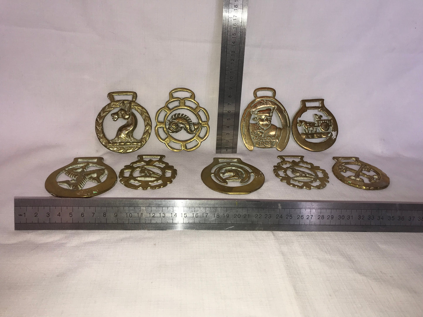 Group of 9 horse brasses