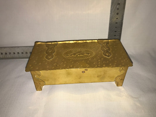 Brass box that says Gargoyle on top
