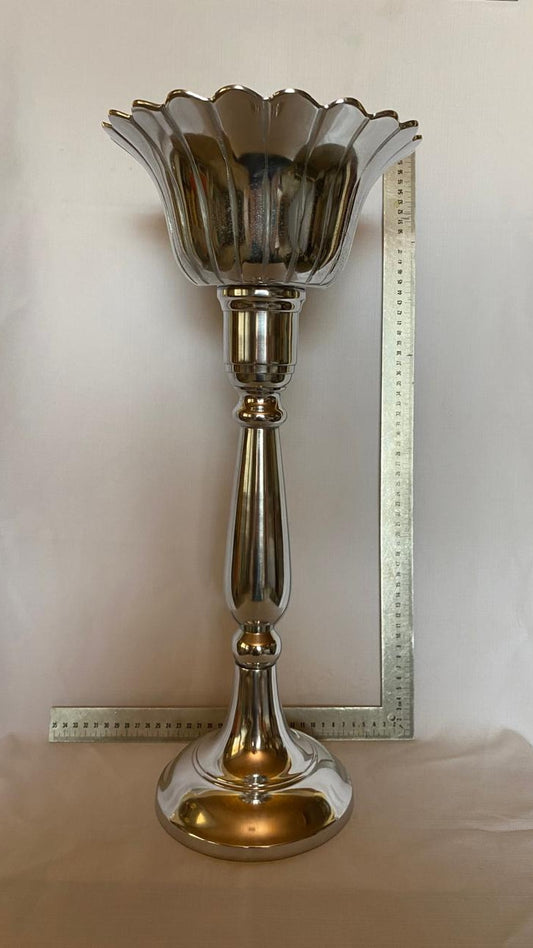 Tall metal candle stick