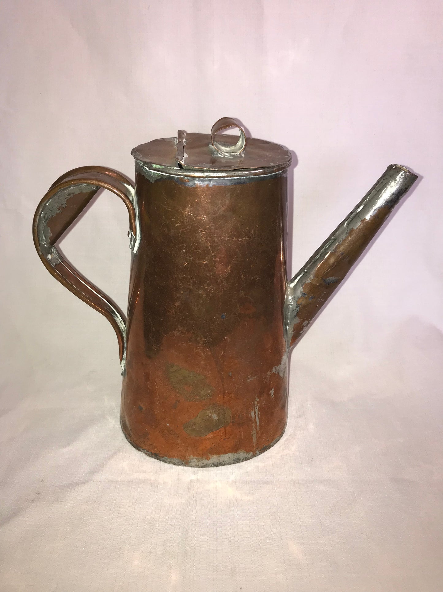 Rustic copper tea pot