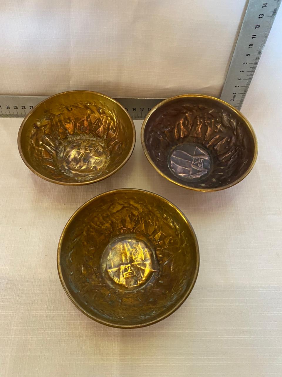 Group of 3 small brass bowls