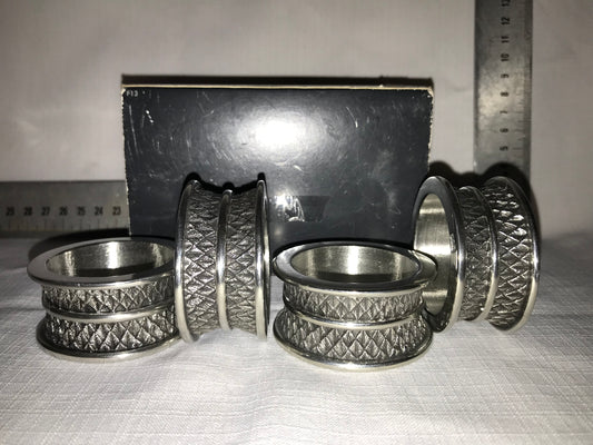 Diana Carmichael 4 metal napkin rings in box