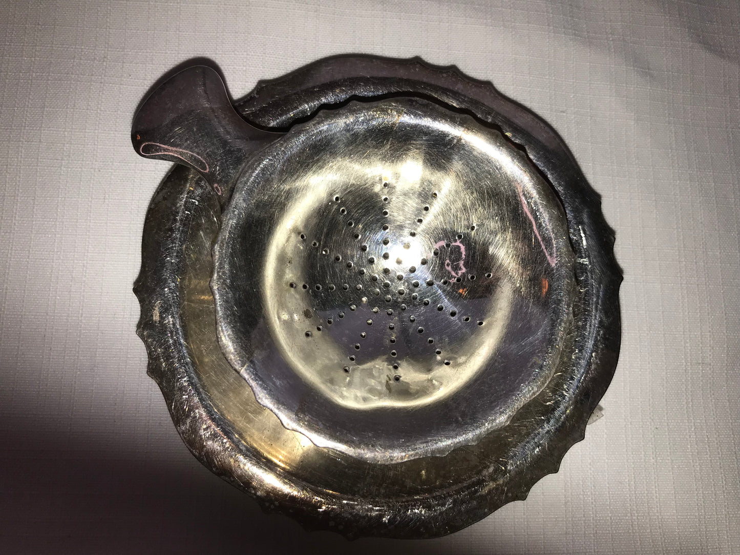 Silver-plated tea strainer