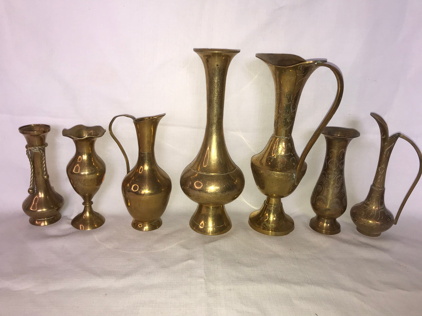 Group of 7 brass vases