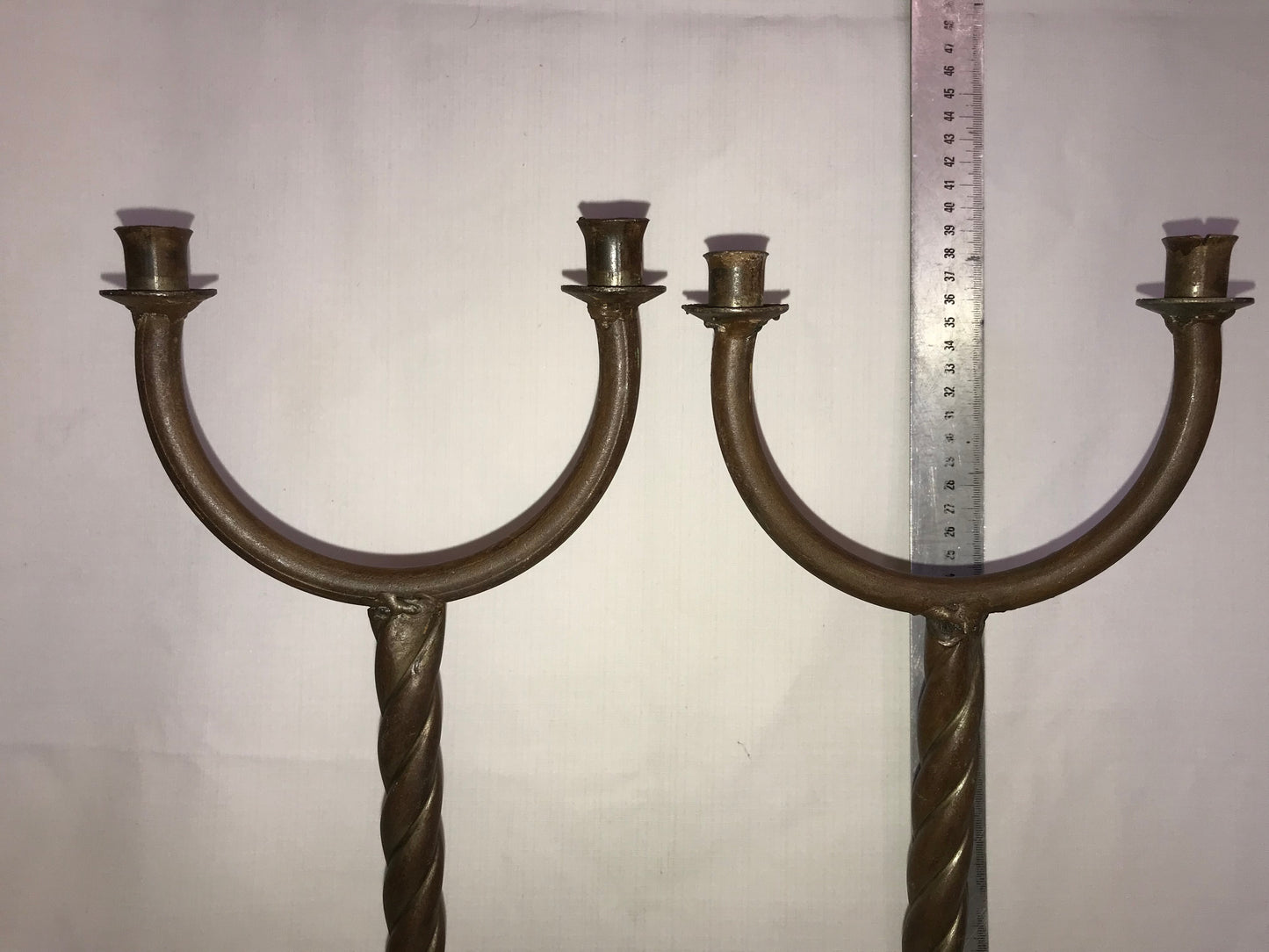 Pair of twisted metal candle sticks