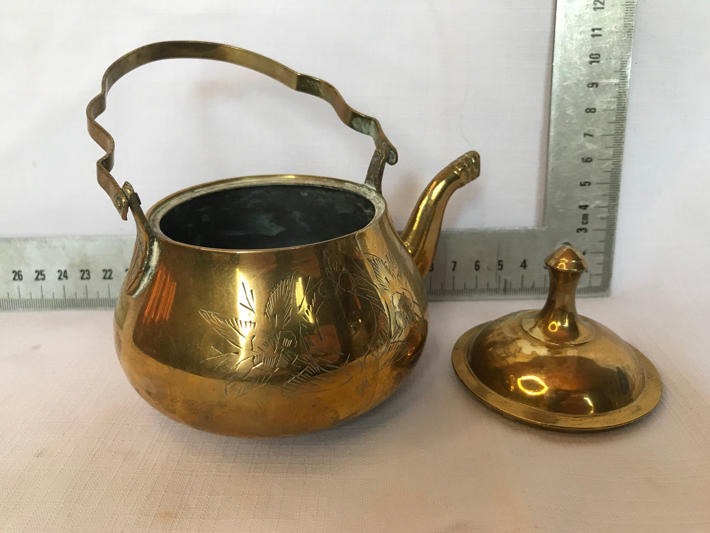 Small brass tea pot with lid