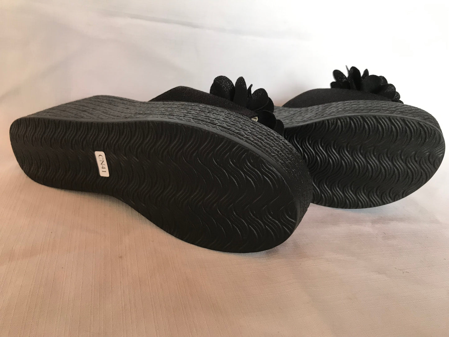 Black wedge platform with flower detail size 7