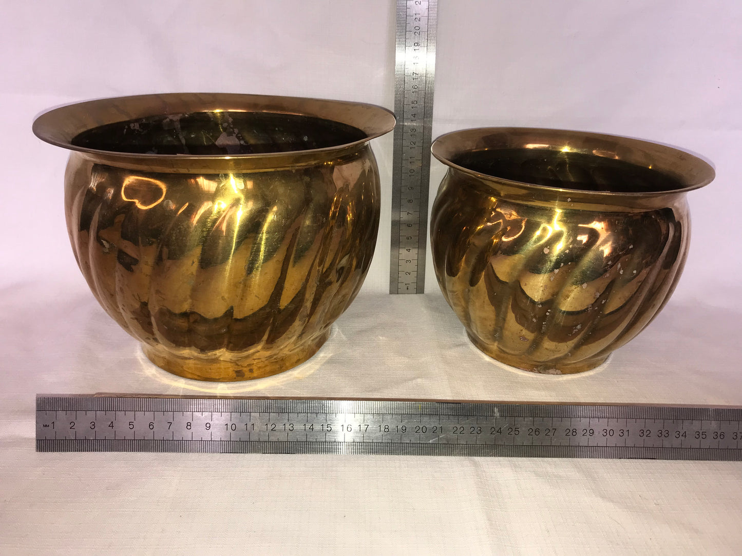 Two brass planters