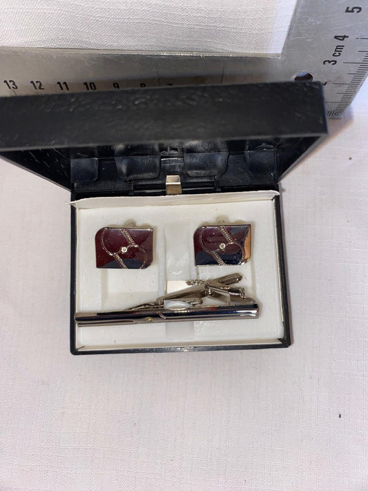 Cuff links and tie pin in box