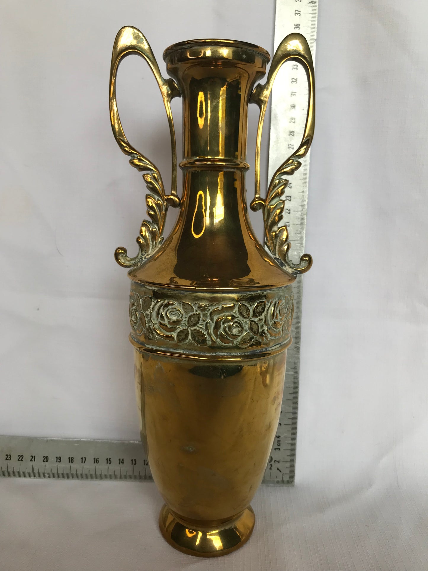 Brass vase with rose detail