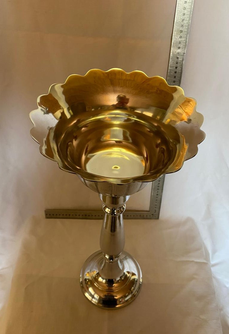 Tall metal candle stick