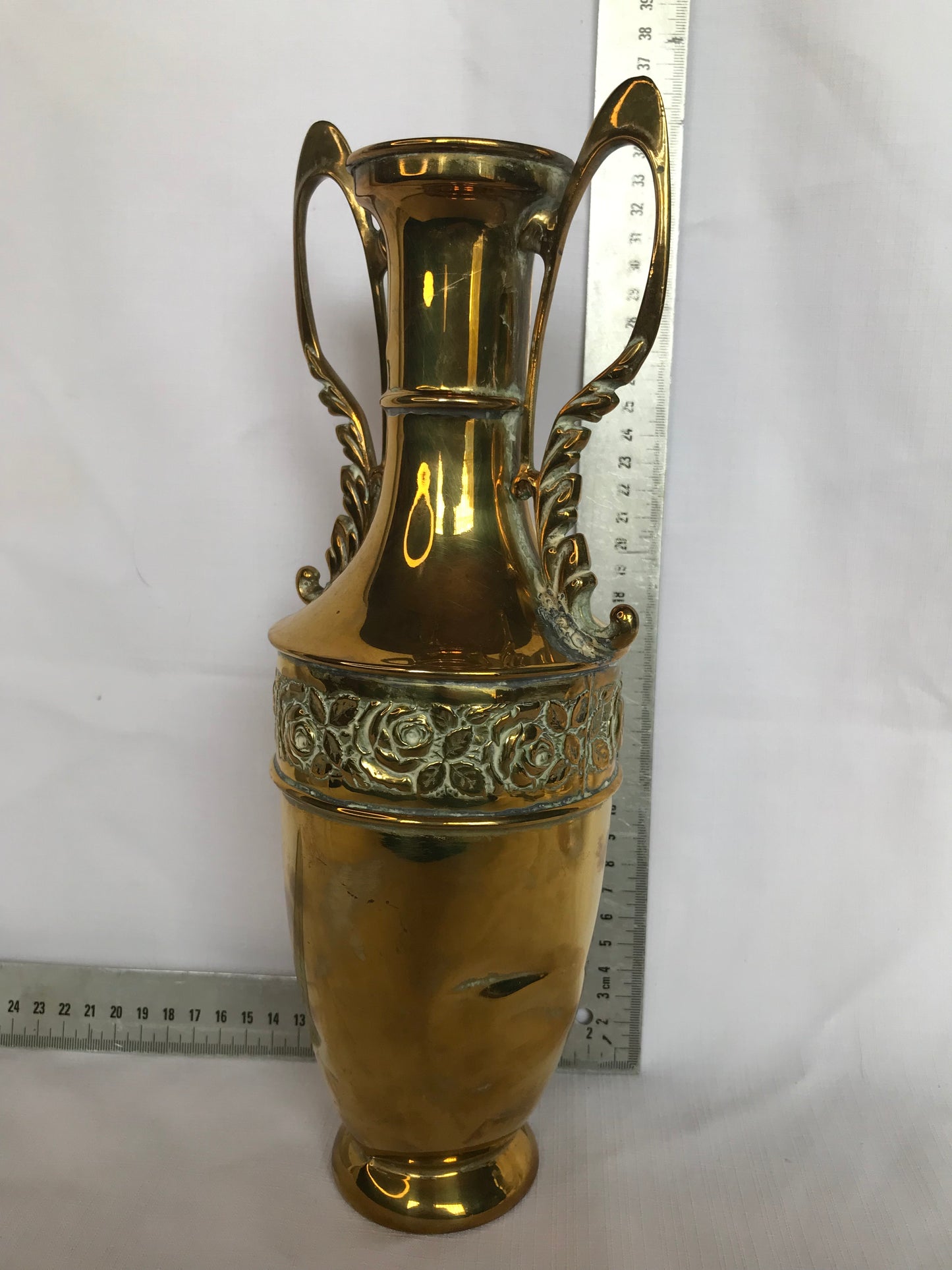 Brass vase with rose detail