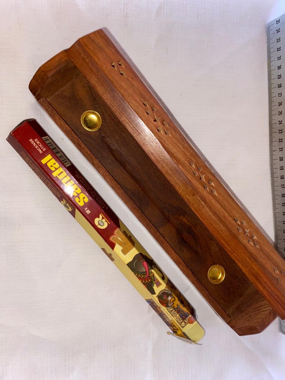 Wooden incense box with brass elephant inlays