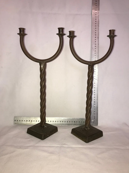 Pair of twisted metal candle sticks