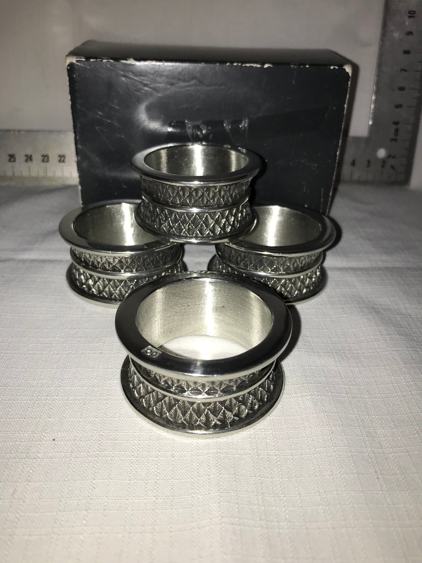 Diana Carmichael 4 metal napkin rings in box