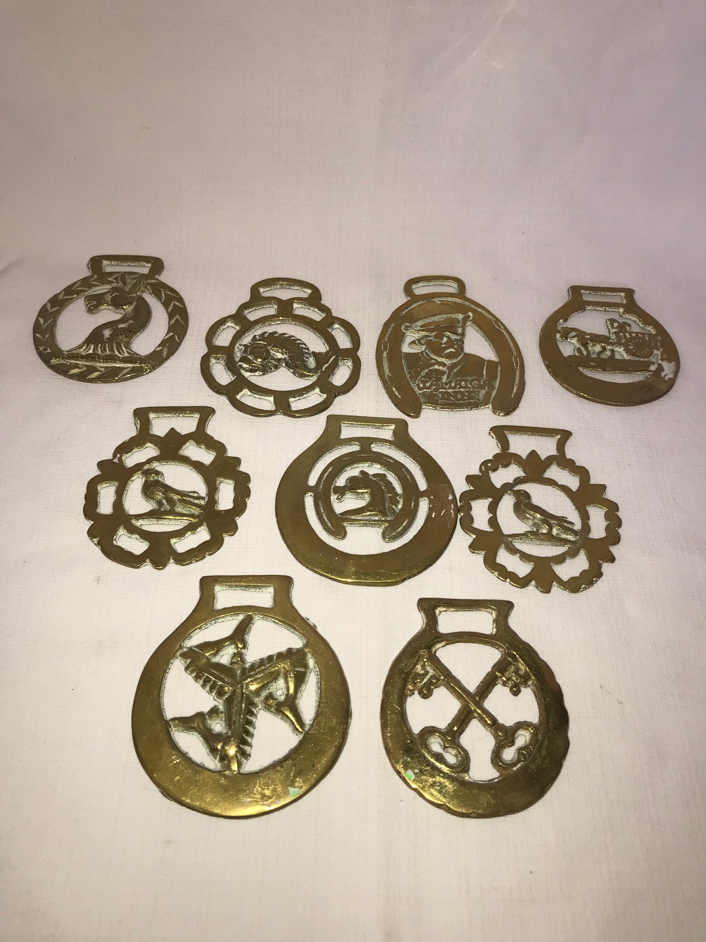 Group of 9 horse brasses